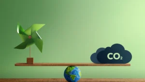 Uma gangorra equilibrada sobre um globo terrestre de papel machê, representando o mercado de créditos de carbono. Do lado esquerdo, um cata-vento verde simboliza energias renováveis. Do lado direito, uma nuvem azul escura de emissões de CO2 contém o texto 'VALORIZAÇÃO DE ATIVOS' e 'GERAÇÃO DE RECEITA', ilustrando a monetização da descarbonização empresarial.