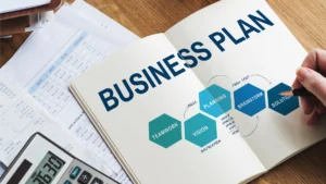 Caderno escrito 'Business Plan' com título sobre plano de negócios de água mineral